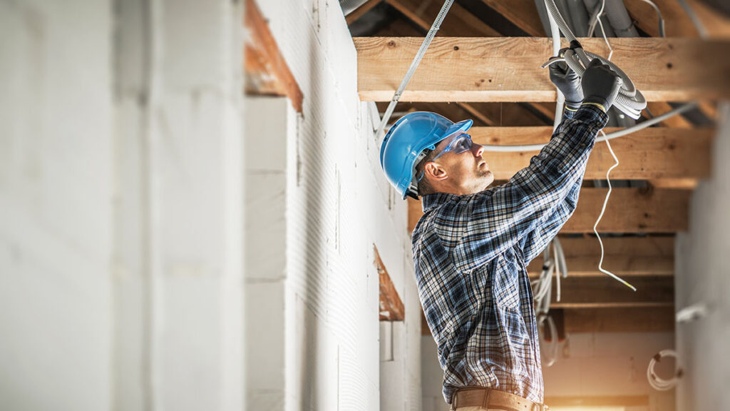 Electrician Working On Wiring Repair