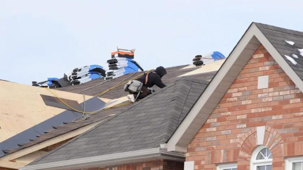 Roofer Replacing Roof