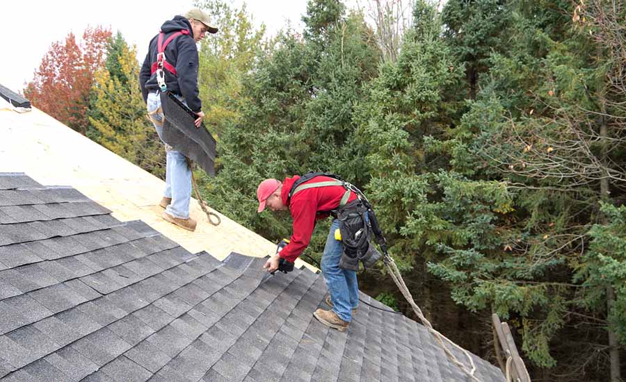 Roofers Laying Shingles Lg